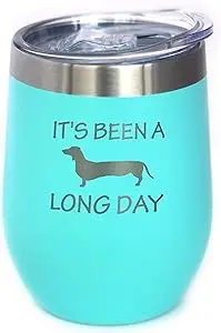 Teal insulated mug with a dachshund on it saying It's been a long day