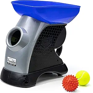 A sleek automatic dog ball launcher with blue top, tennis ball, and rubber fetch toy beside it.