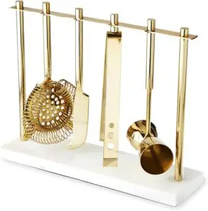 CLICK HERE. Twine Gold Barware Set, Hawthorne Strainer, Citrus Knife, Ice Tongs, Double Jigger, Marble Stand, Stainless Steel with Gold Finish, Set of 4