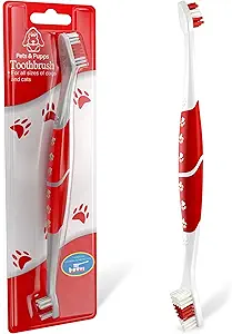 Pets & Pupps dual-headed dog toothbrush with red handle and paw print design, suitable for all dog and cat sizes