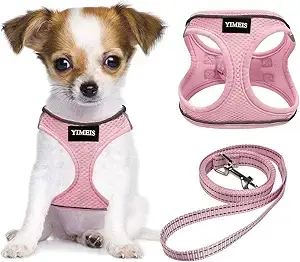 White and black TUG retractable dog leash with ergonomic handle and durable clip for easy, controlled walks.