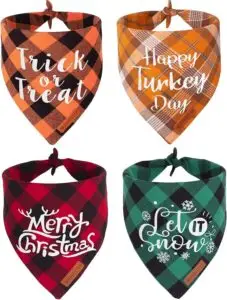 Set of four seasonal plaid dog bandanas with festive sayings — “Trick or Treat,” “Happy Turkey Day,” “Merry Christmas,” and “Let it Snow” — fun holiday accessories in fall essentials for dogs 2025.