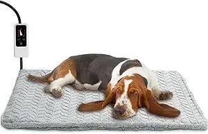 Basset Hound resting on a soft gray heated dog bed with digital controller — a warm and soothing option in fall essentials for dogs 2025.